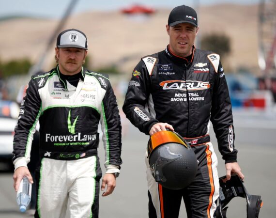 SONOMA, CALIFORNIA - JUNE 10: Jeffrey Earnhardt, driver of the #45 ForeverLawn Chevrolet, (L) and Alex Labbe, driver of the #29 RSS Racing Ford, walk the grid during qualifying for the NASCAR Xfinity Series DoorDash 250 at Sonoma Raceway on June 10, 2023 in Sonoma, California. (Photo by Sean Gardner/Getty Images)